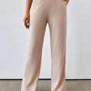 Pantalones casuales de pierna recta y cintura alta con bolsillos diagonales dobles