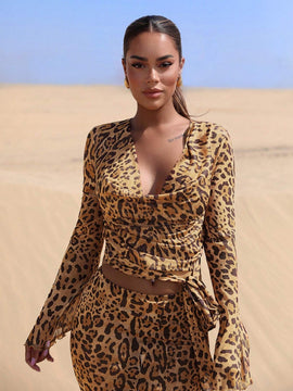 Blusa de malla traslucida con estampado de leopardo para mujer con cuello drapeado y lazo en la parte delantera