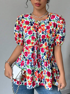Blusa de manga abullonada con estampado floral y cuello de lazo