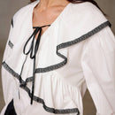 Camisa holgada para mujer con estilo chic y bloque de color adecuada para el trabajo y la conmutacion con dobladillo y punos de volantes