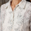 Camisa de manga de campana con corte aleatorio y diseno unico para estilizar la cintura, con flores al estilo frances para adelgazar