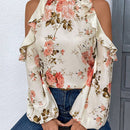 Blusa de hombros descubiertos con estampado floral, ribete de volantes y mangas tipo linterna