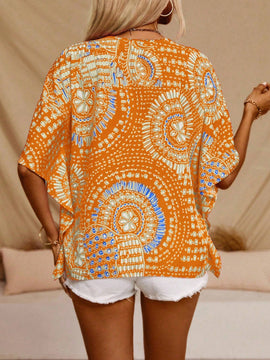 Blusa de manga murcielago con diseno floral en toda la prenda