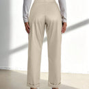 Pantalones largos de tela metalica con nudo frontal para mujer