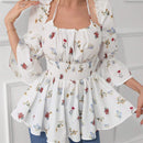 Blusa acampanada con mangas de volante y Body fruncido con estampado floral y cintura peplum
