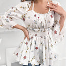 Blusa acampanada con mangas de volante y Body fruncido con estampado floral y cintura peplum