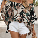 Blusa holgada con hombros descubiertos, mangas murcielago y estampado completo