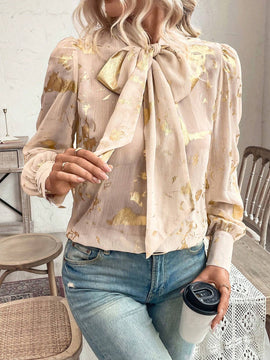 Blusa con lazo en el cuello y estampado grafico