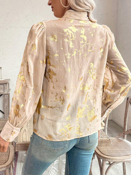 Blusa con lazo en el cuello y estampado grafico