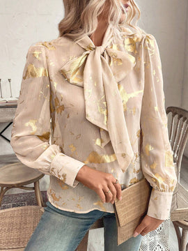 Blusa con lazo en el cuello y estampado grafico