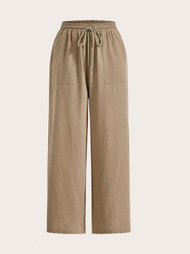 Pantalones sueltos de pierna ancha de color solido para mujer con dobladillo fluido, estilo casual