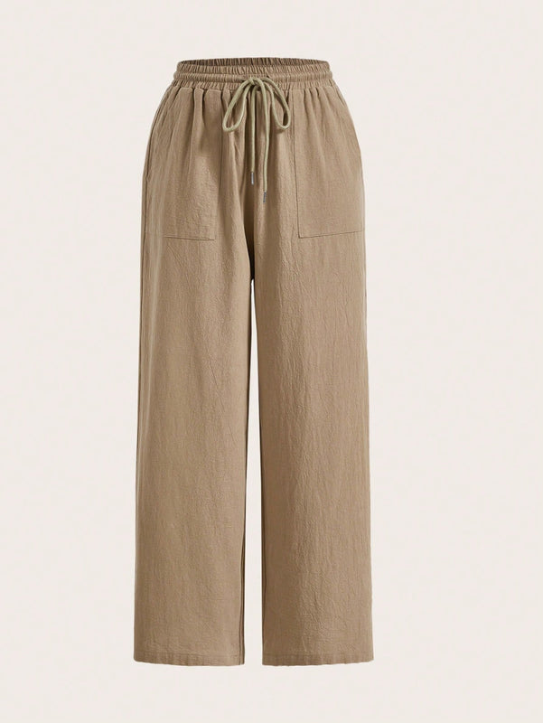 Pantalones sueltos de pierna ancha de color solido para mujer con dobladillo fluido, estilo casual