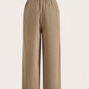 Pantalones sueltos de pierna ancha de color solido para mujer con dobladillo fluido, estilo casual