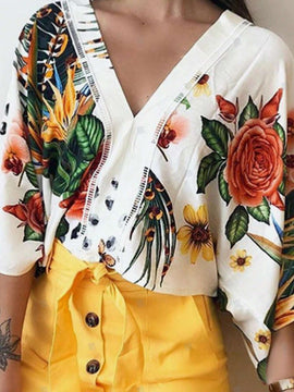 Blusa de manga murcielago con estampado tropical para el verano