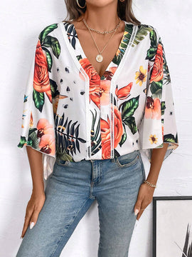Blusa de manga murcielago con estampado tropical para el verano