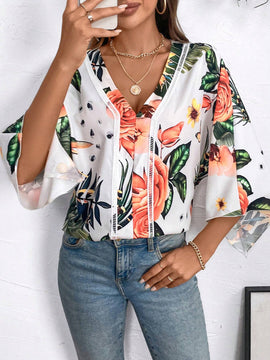 Blusa de manga murcielago con estampado tropical para el verano