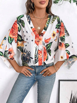 Blusa de manga murcielago con estampado tropical para el verano