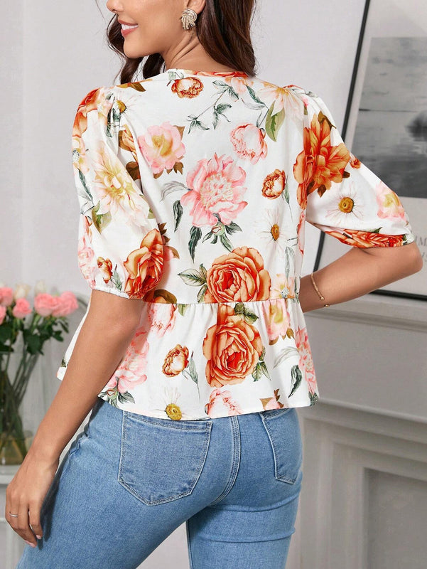Blusa de cuello redondo con mangas gigot y textura de patron floral de tela