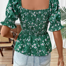 Blusa de volantes con mangas abullonadas y estampado floral para las vacaciones de verano