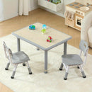 Conjunto de mesa y sillas, que mide 80.01 cm de largo por 59.94 cm de ancho, con una mesa de actividades duradera con patas de acero inoxidable, acompañada de dos sillas con cubiertas antideslizantes para los pies y un tablero de mesa estilo graffiti.