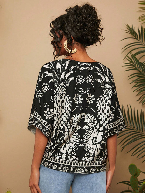Camisa de mujer tejida con impresion, cuello en V, manga murcielago y estilo holgado regular para vacaciones