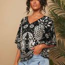 Camisa de mujer tejida con impresion, cuello en V, manga murcielago y estilo holgado regular para vacaciones