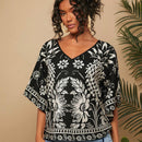 Camisa de mujer tejida con impresion, cuello en V, manga murcielago y estilo holgado regular para vacaciones