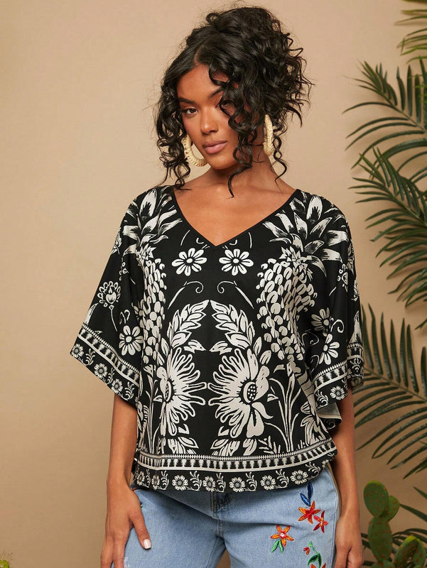 Camisa de mujer tejida con impresion, cuello en V, manga murcielago y estilo holgado regular para vacaciones