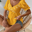 Camisa impresa con mangas abullonadas y bloques de color para ocasiones informales