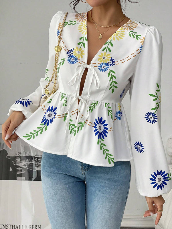 Blusa blanca de manga larga impresa con volantes, lazo delantero y manga farol