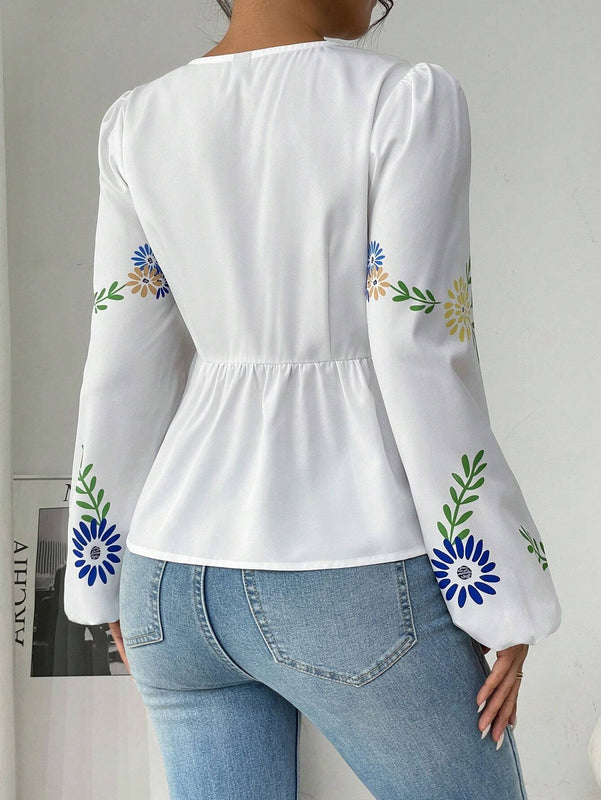 Blusa blanca de manga larga impresa con volantes, lazo delantero y manga farol