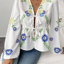 Blusa blanca de manga larga impresa con volantes, lazo delantero y manga farol