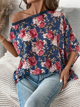 Camisa de manga murcielago con cuello asimetrico y estampado floral para mujer en verano