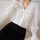 Top largo texturizado de manga larga para mujer con lazo frontal plisado de encaje, simple y casual, perfecto para vacaciones