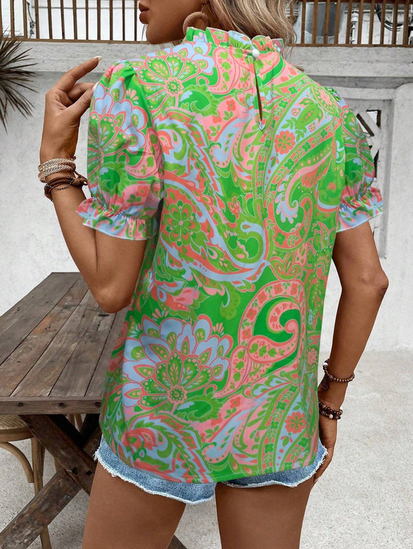 Blusa estampada con cuello con volantes, mangas abullonadas elasticas y adecuada para las vacaciones