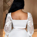 Blusa sexy de manga transparente con ribete de volantes