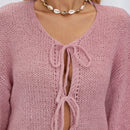 Frenchy cardigan de punto unicolor de color rosa palido con cinturon delantero, se puede usar sobre una camiseta
