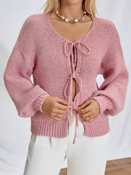 Frenchy cardigan de punto unicolor de color rosa palido con cinturon delantero, se puede usar sobre una camiseta