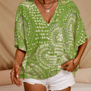 Blusa casual holgada con estampado floral, cuello en V y mangas tipo murcielago para mujer