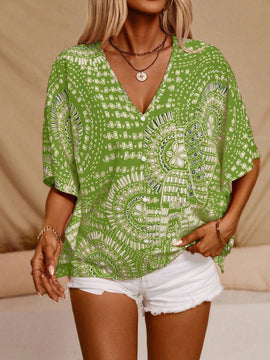 Blusa casual holgada con estampado floral, cuello en V y mangas tipo murcielago para mujer