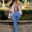 Blusa de manga larga con cuello alto y estampado floral para mujer