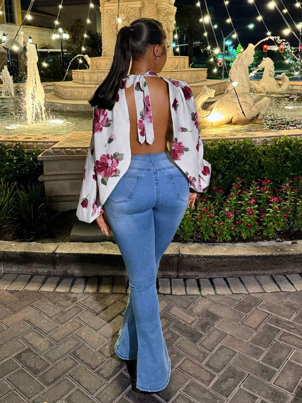 Blusa de manga larga con cuello alto y estampado floral para mujer