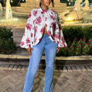 Blusa de manga larga con cuello alto y estampado floral para mujer