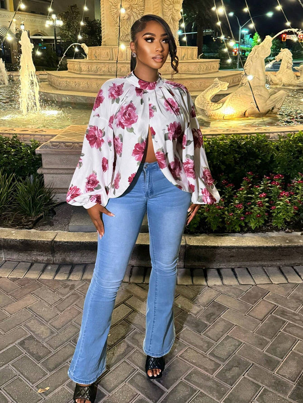 Blusa de manga larga con cuello alto y estampado floral para mujer
