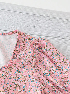 Blusa casual con mangas abullonadas y estampado floral para mujeres