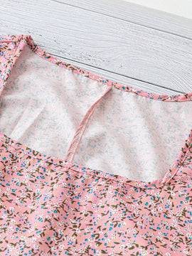 Blusa casual con mangas abullonadas y estampado floral para mujeres
