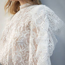 Blusa casual transparente de manga larga con botones en la espalda y bordado, de unicolor, para el ocio diario y las vacaciones