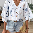 Camisa casual floja con cuello en V y botones de mujer, con estampado romantico de plantas y flores y mangas murcielago, perfecta para vacaciones