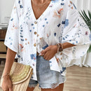 Camisa casual floja con cuello en V y botones de mujer, con estampado romantico de plantas y flores y mangas murcielago, perfecta para vacaciones