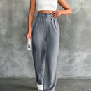 Pantalones altos de pierna ancha con pliegues